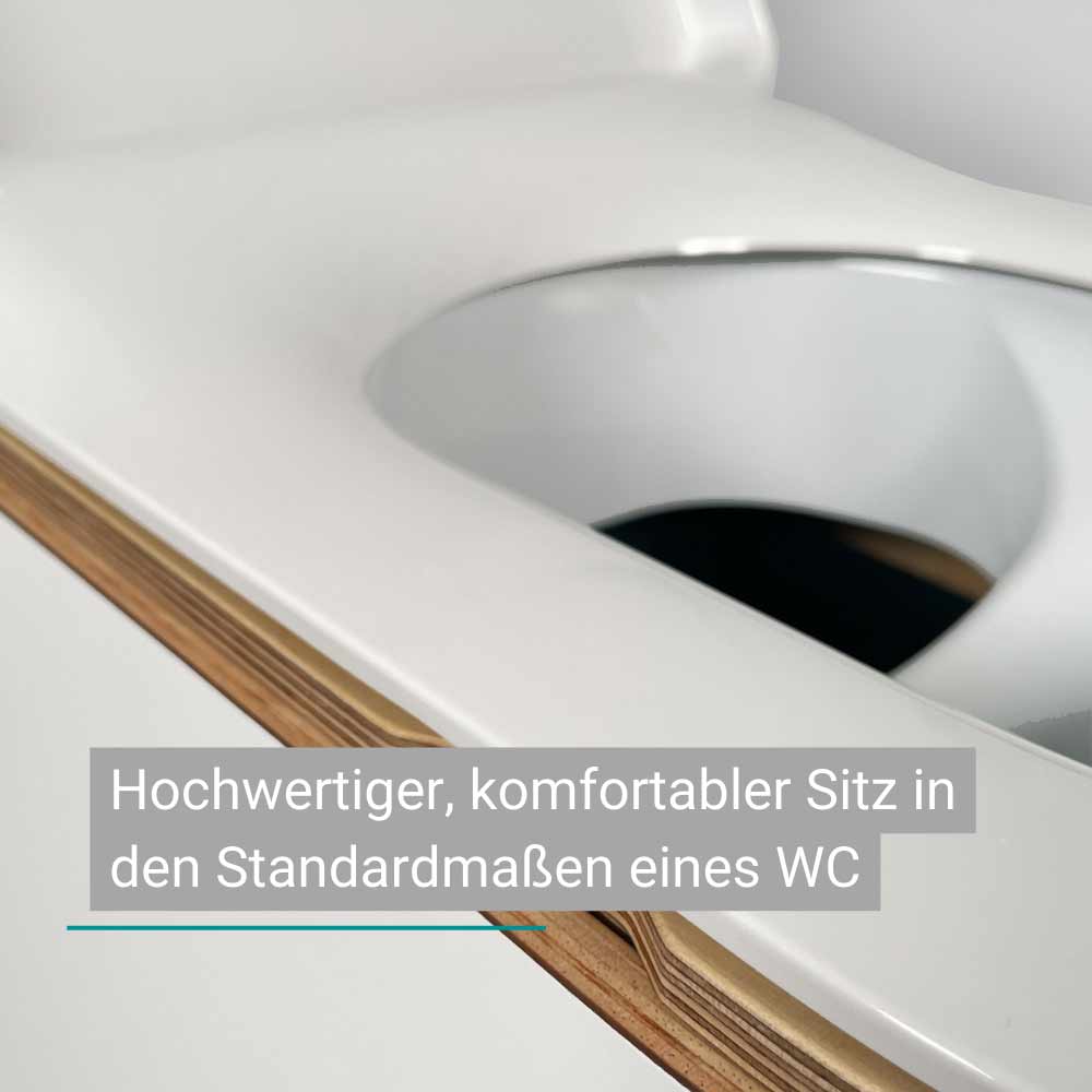 Trenntoilette mit weißem Trenneinsatz und Holzverkleidung in modernem Design.