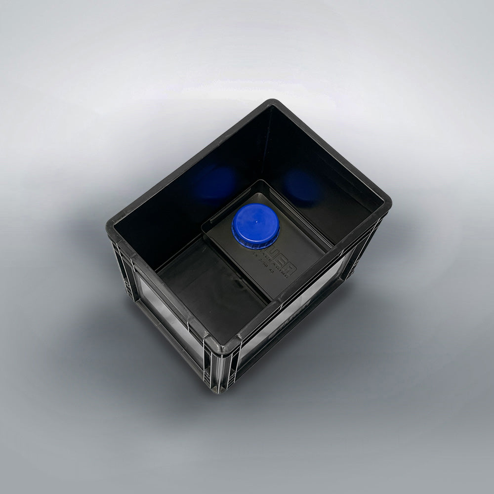 Black DIY Eurobox composting toilet with blue urine canister cap.