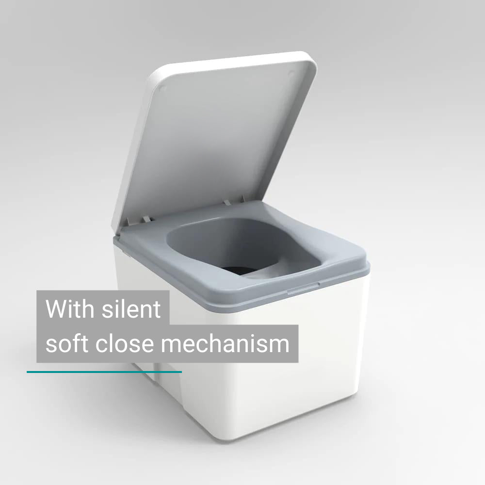 Compact white composting toilet with gray lid and silent soft-close mechanism.