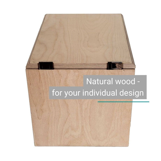 Compact DIY wooden toilet made of light beech wood with hinges and a smooth, lacquered surface.