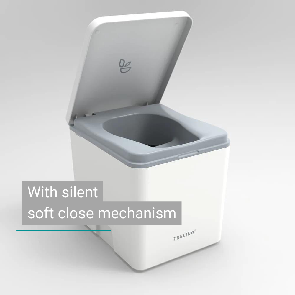 White Trelino Evo M composting toilet with open lid and soft-close mechanism.
