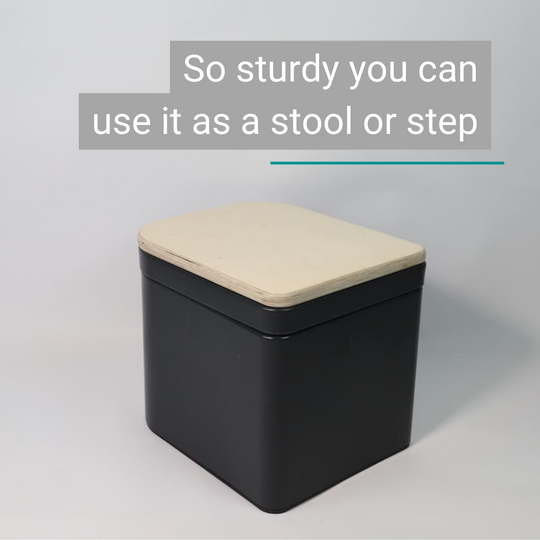 Compact anthracite Trelino® Origin M composting toilet with light wood lid, robust and multifunctional, can be used as a stool.