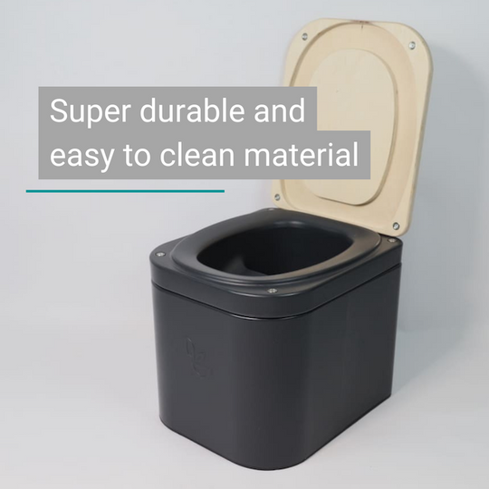 Black composting toilet with light wood lid, square, compact, modern, and easy to maintain.