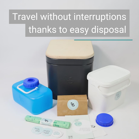 Trelino Origin M composting toilet with wooden lid, blue urine container, and solid waste container.